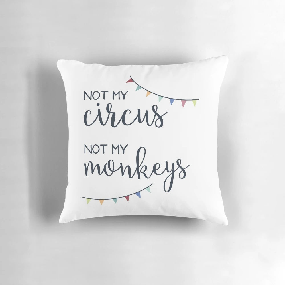 Not My Circus, Not My Monkeys decorative pillow featuring a fun, humorous saying in cursive typography.