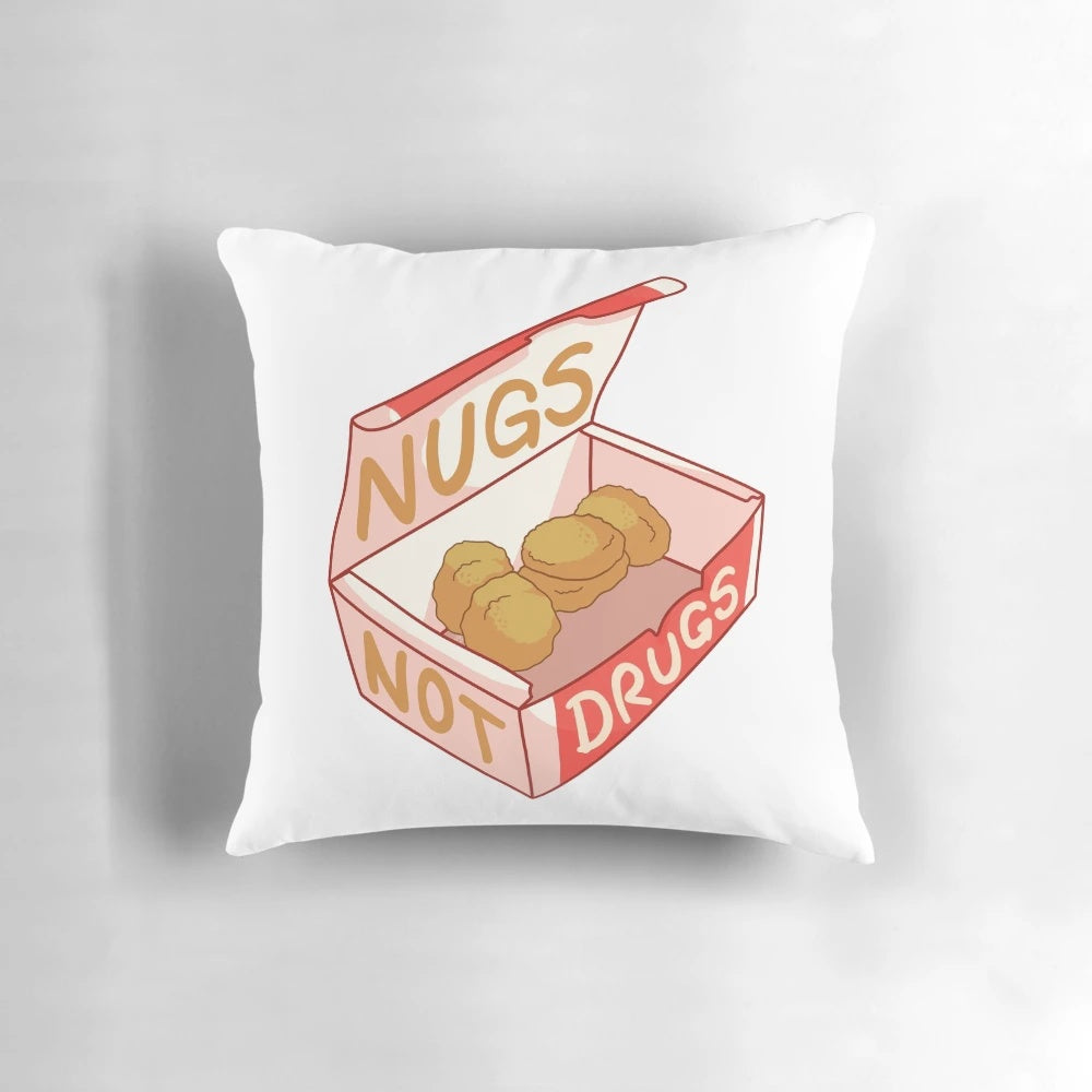 A soft, plush pillow featuring a "Nugs Not Drugs" cartoon design, perfect for food and pop culture enthusiasts.