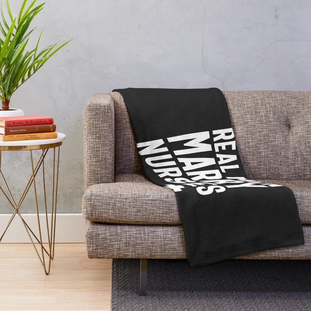 Plush blanket with the text "Real Men Marry Nurses" featuring focus keyword nursing