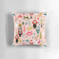 Blush-colored Nutcracker ballet-themed pillow with dance and classical music motifs