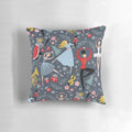A Pillow featuring a Nutcracker Ballet design by Robin Pickens, showcasing dancers and the iconic Clara character.