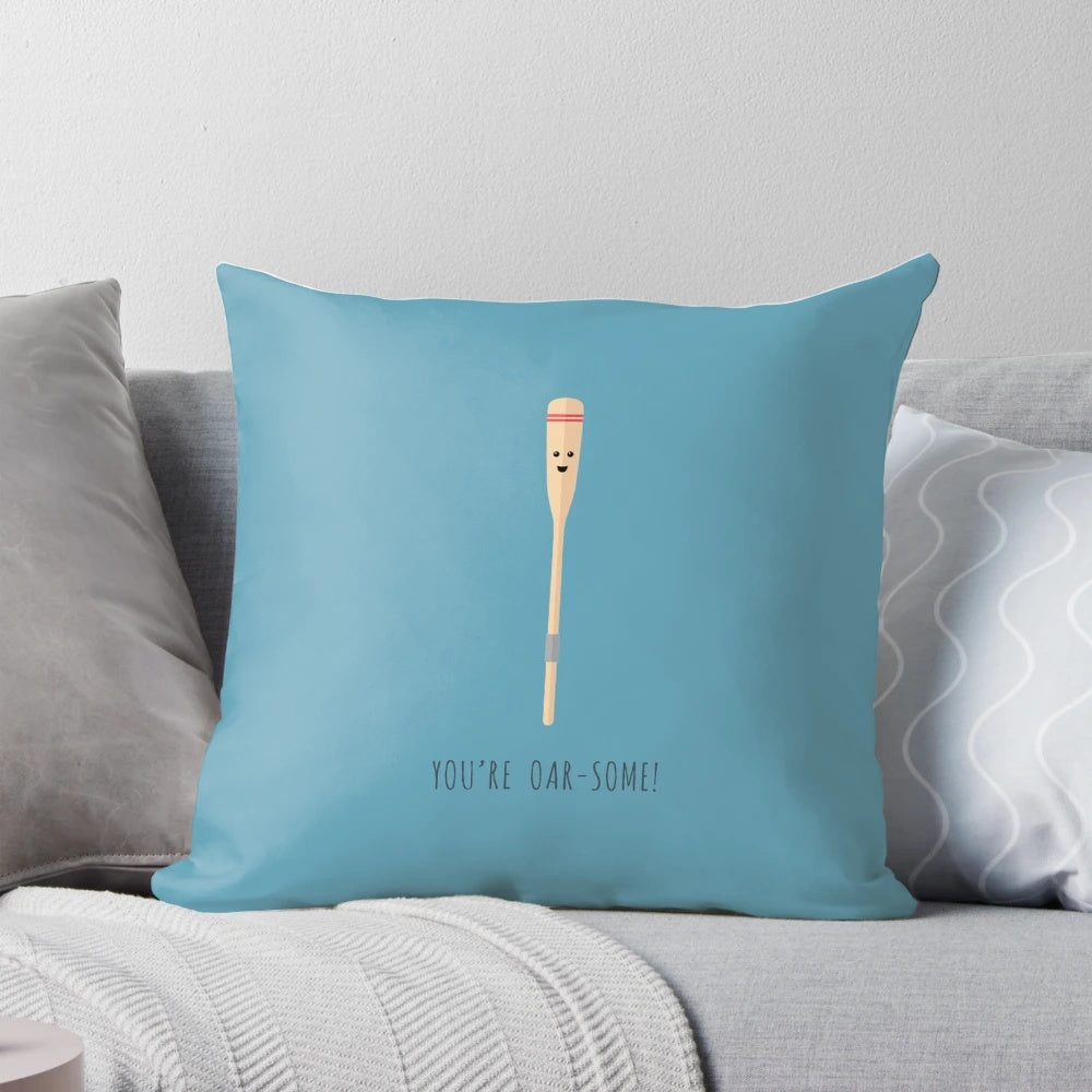 A white, square pillow with the text "Oar-some!" printed on it in a fun, whimsical font.