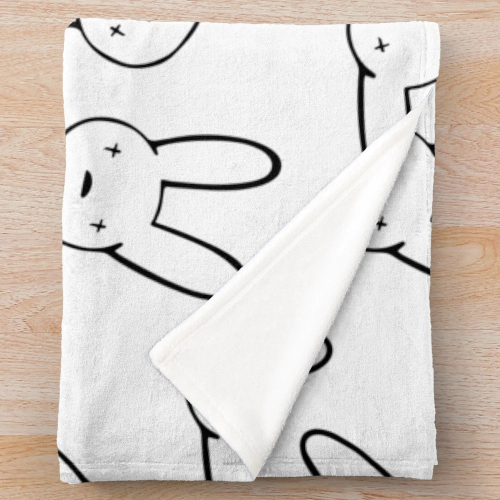 Oasis logo pattern plush blanket featuring a crosseyed rabbit icon, inspired by Puerto Rican pop culture icon Bad Bunny