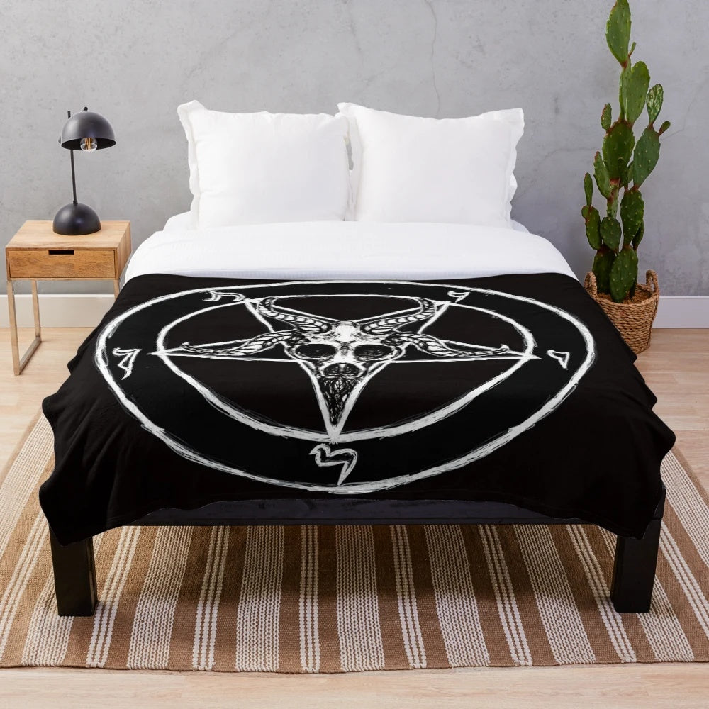 Occult-themed plush blanket with pentagram and goat skull design