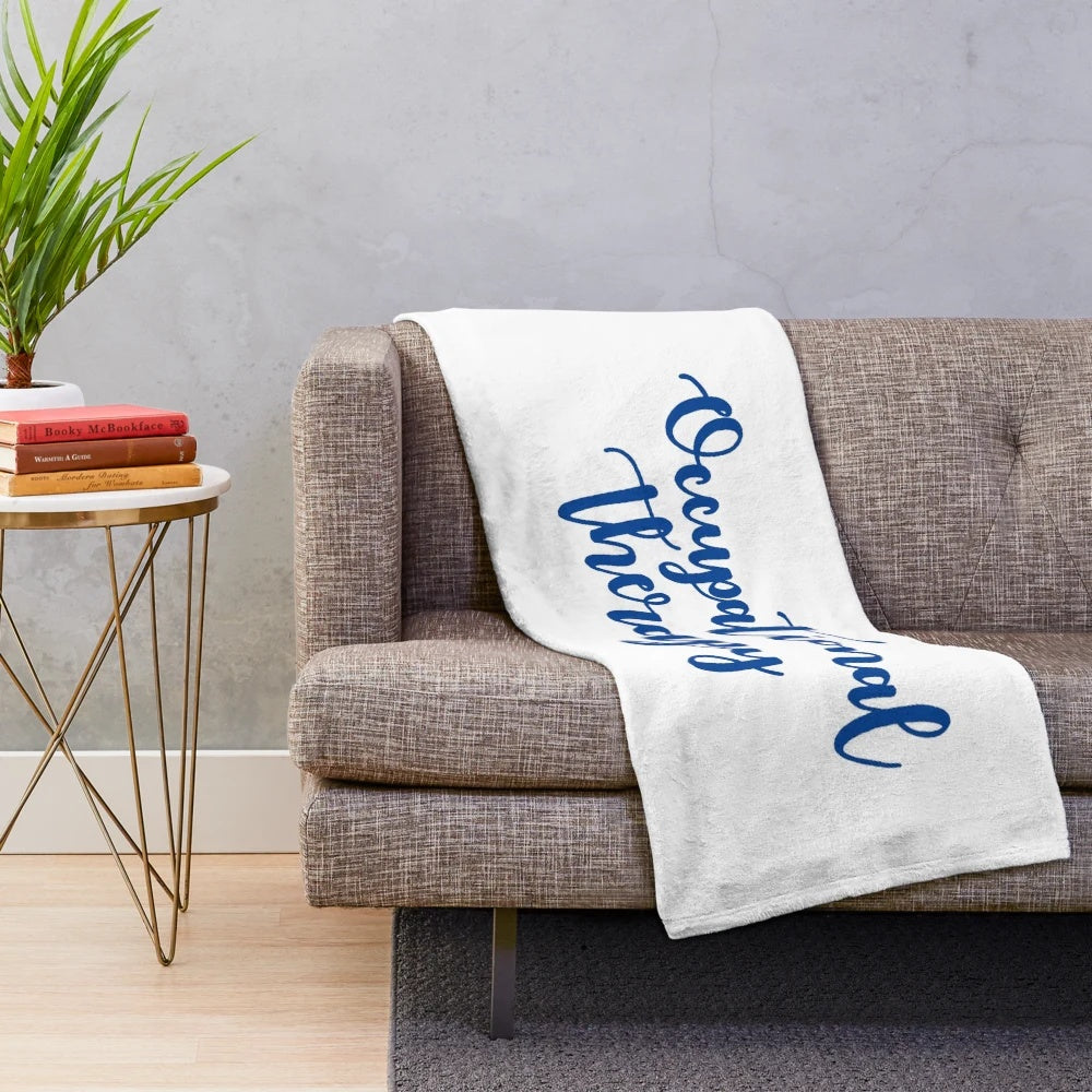 Occupational therapy inspired plush blanket with cursive blue design