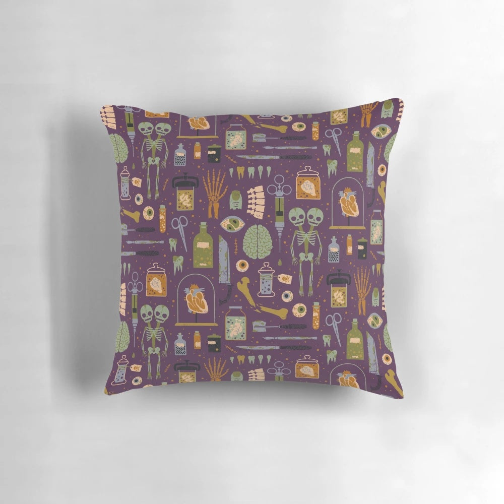 Oddities Pillow featuring a macabre and anatomical design for a unique and creepy home decor piece
