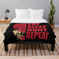 Odogaron inspired plush blanket featuring the "Eat Sleep Hunt Repeat" design