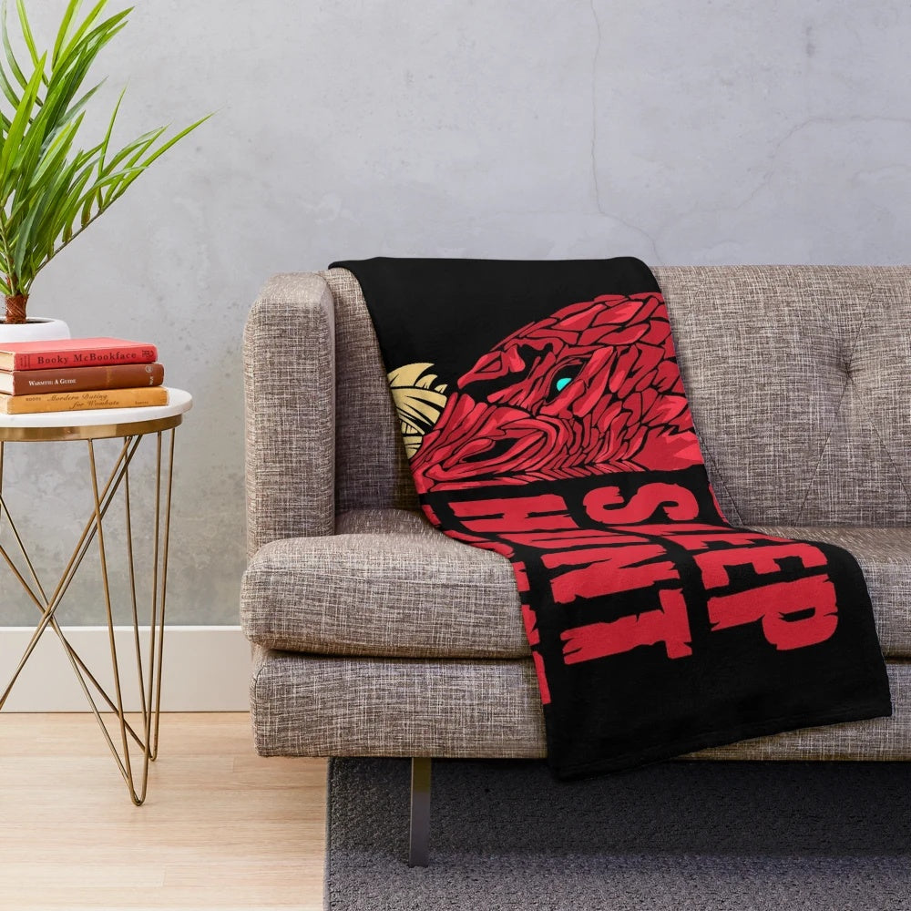 Odogaron inspired plush blanket featuring the "Eat Sleep Hunt Repeat" design