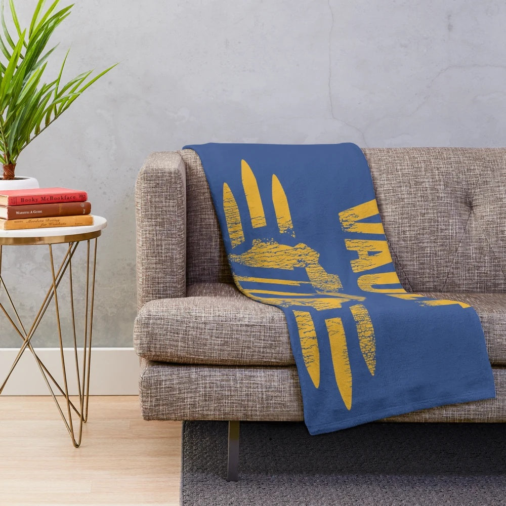 Fallout 111 plush blanket with worn vault logo design