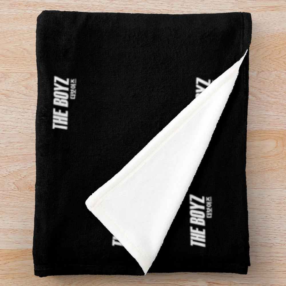 Plush blanket featuring the logo and design of K-pop group The Boyz