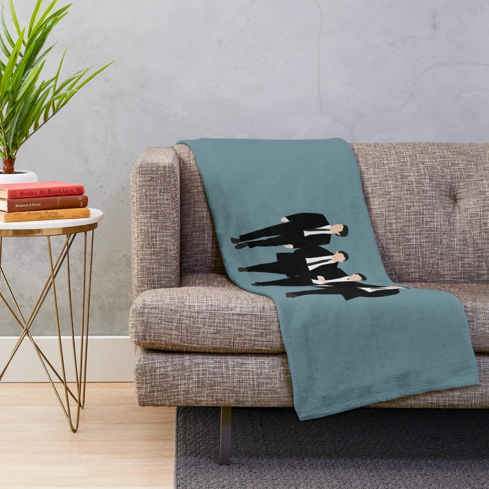 The Beatles Band Plush Blanket featuring the iconic band's logo and imagery