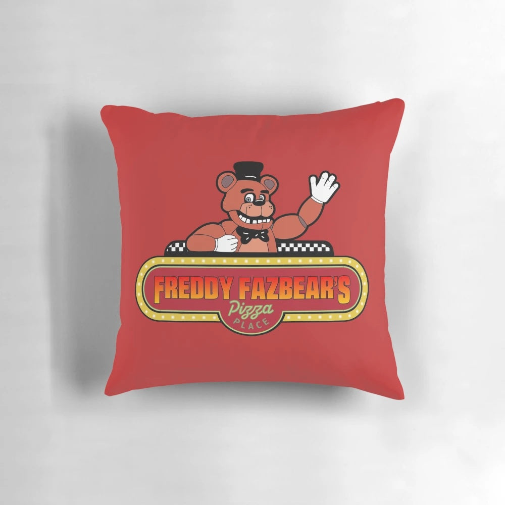 Five Nights at Freddy's Freddy Fazbear movie sign pillow with Freddy's head and the FNAF logo