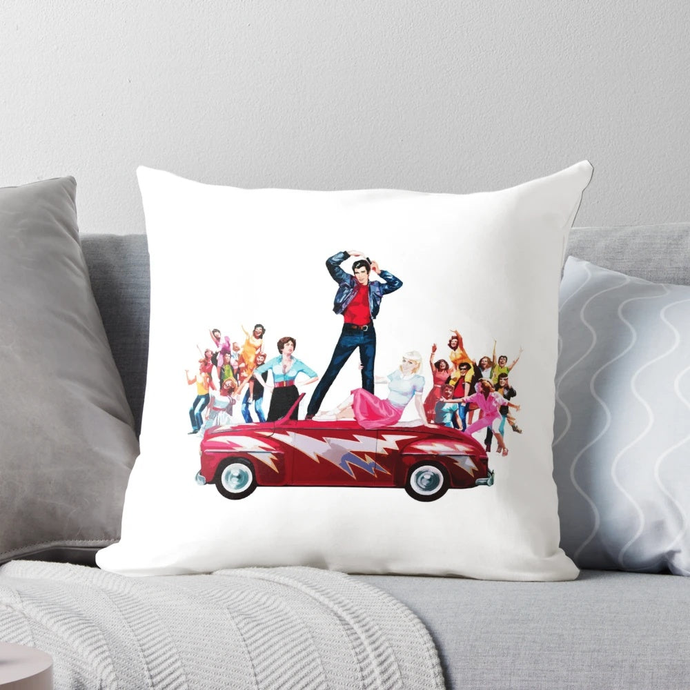 Grease musical-themed decorative pillow featuring characters John Travolta and Olivia Newton John