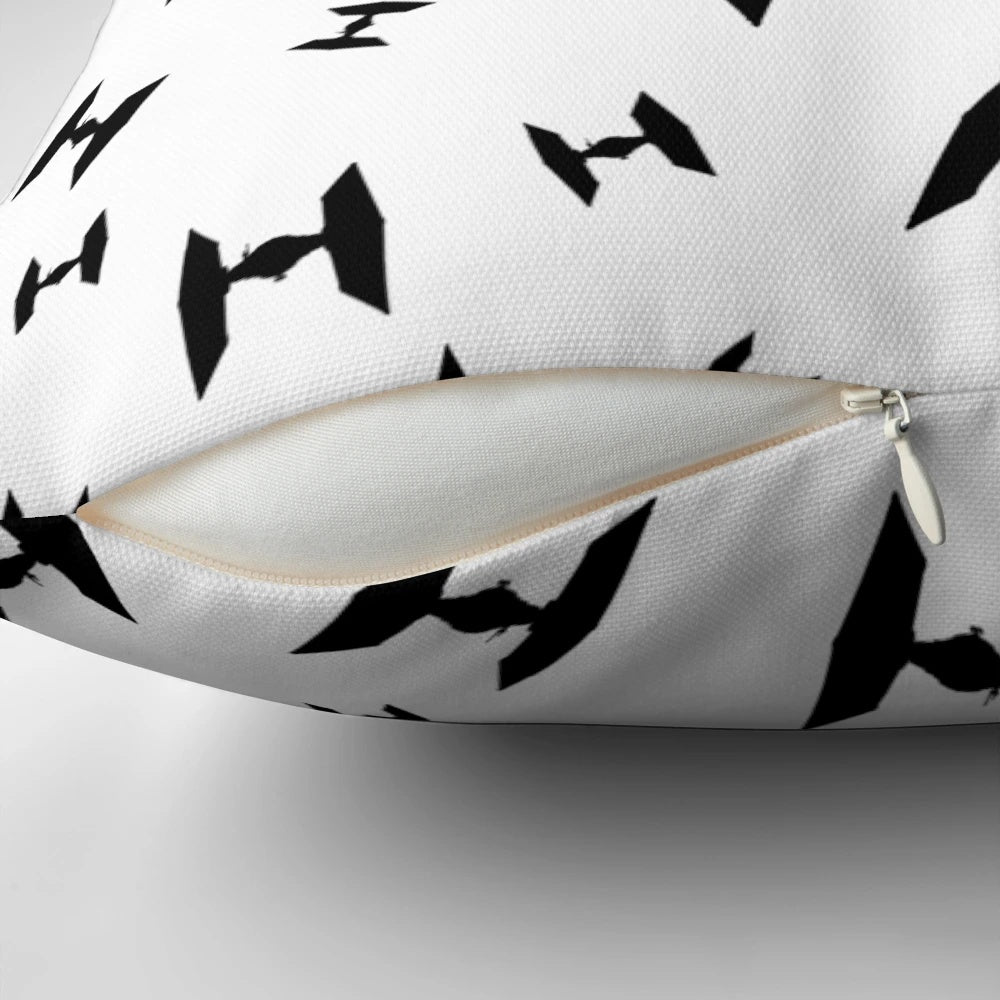 A decorative throw pillow featuring the iconic Tie Fighter spacecraft from the Star Wars universe.