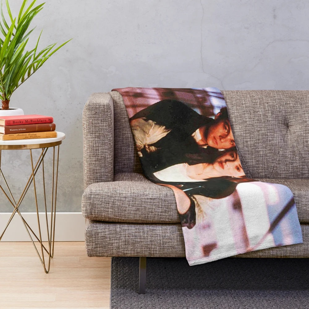 Titanic plush blanket featuring the iconic ship and characters from the classic movie