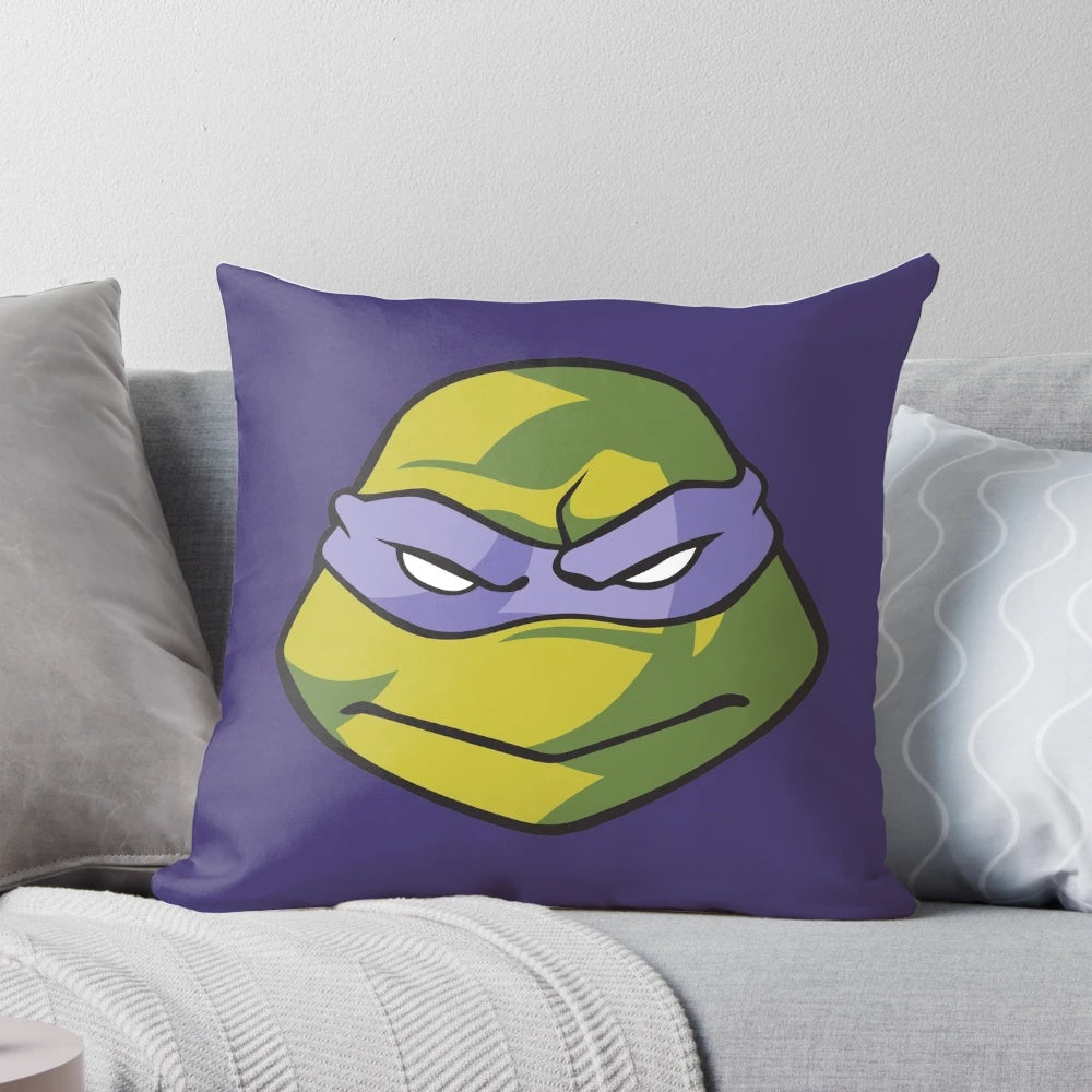 Officially licensed TMNT Donatello face throw pillow, featuring the iconic character from the 1980s cartoon series.