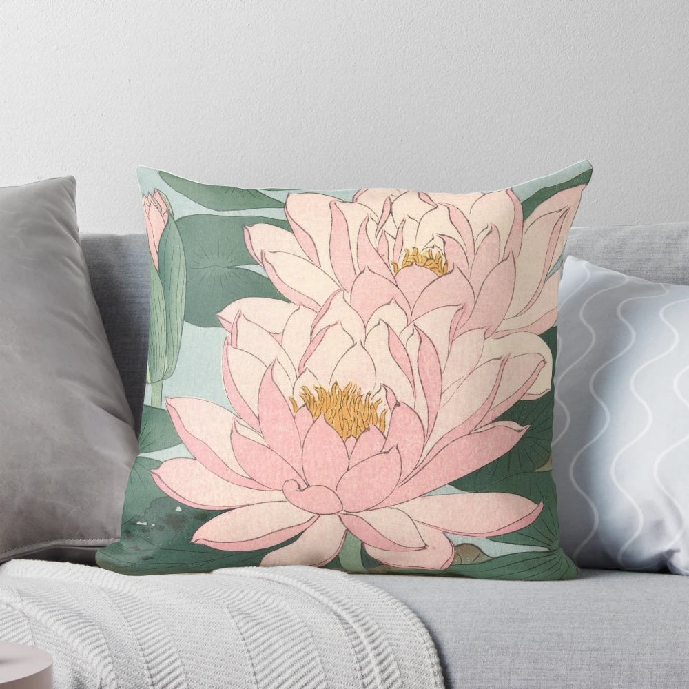 Vintage Japanese woodblock print of a flowering water lily by artist Ohara Koson, printed on a decorative throw pillow.