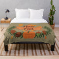 Olive plush blanket with fall leaf pattern design
