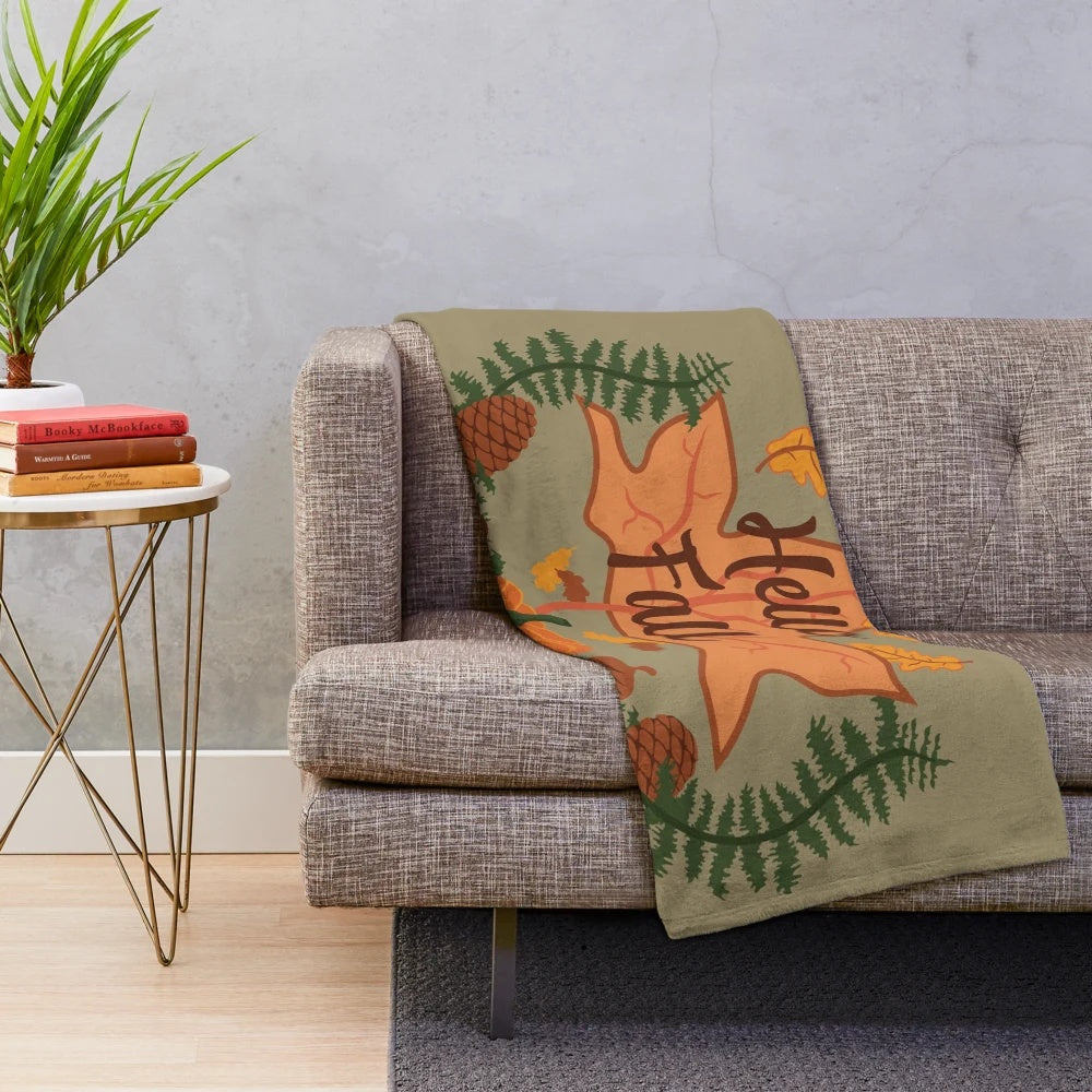 Olive plush blanket with fall leaf pattern design