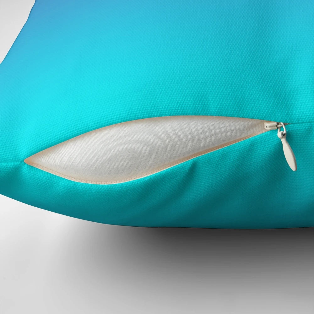 Turquoise and purple ombre gradient pillow with a minimalist, aesthetic design