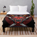 Oni mask-themed plush blanket featuring Japanese cultural art