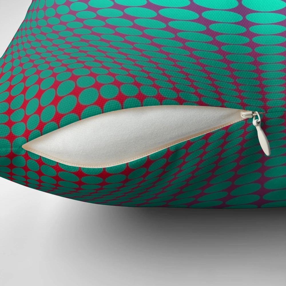 Optical illusion op art pillow featuring a vibrant abstract geometric pattern in red and orange hues