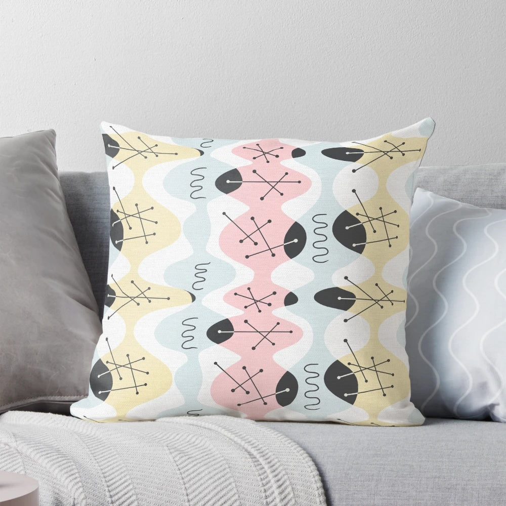 Organic Atomic Bambino Pillow with vibrant geometric pattern in pastel colors
