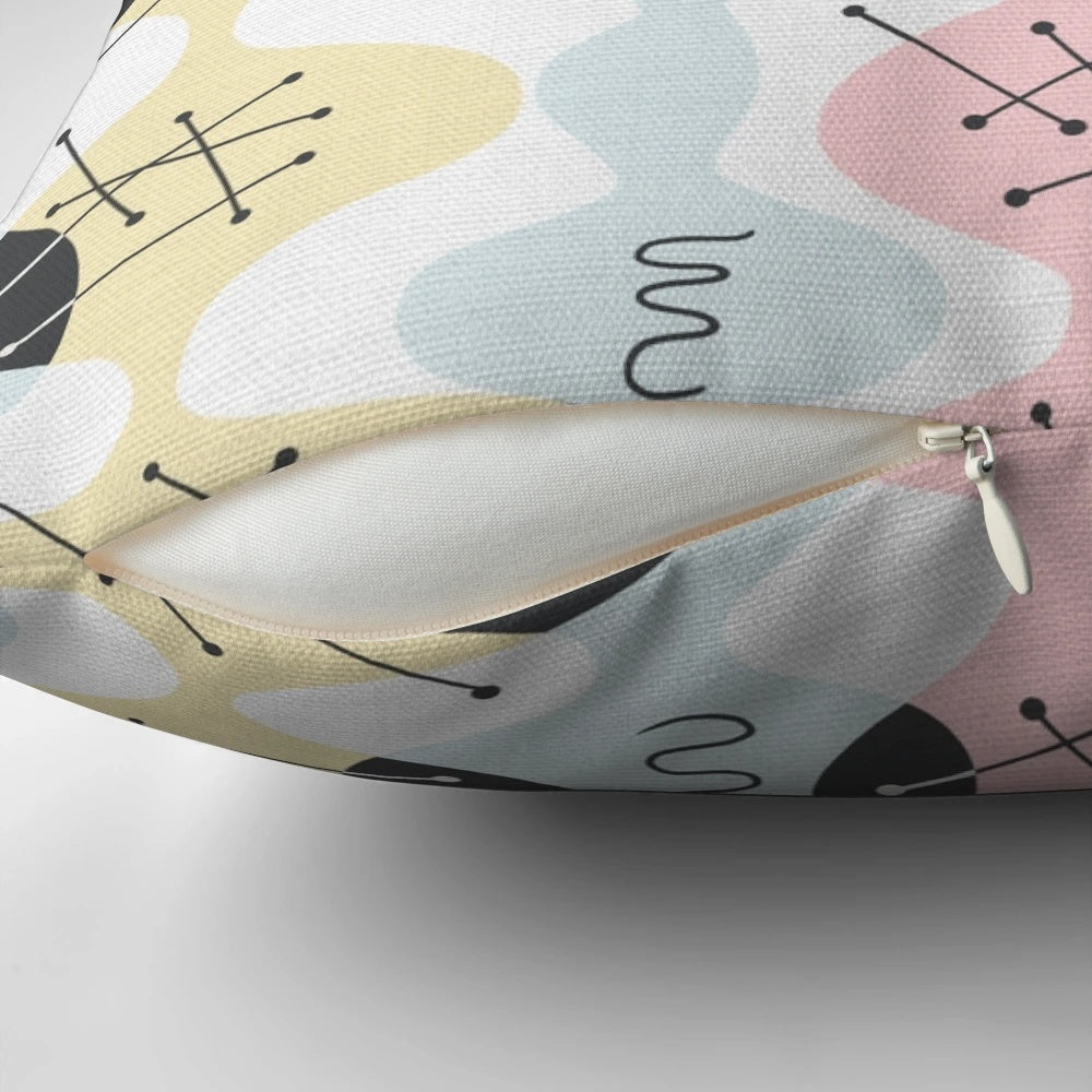 Organic Atomic Bambino Pillow with vibrant geometric pattern in pastel colors