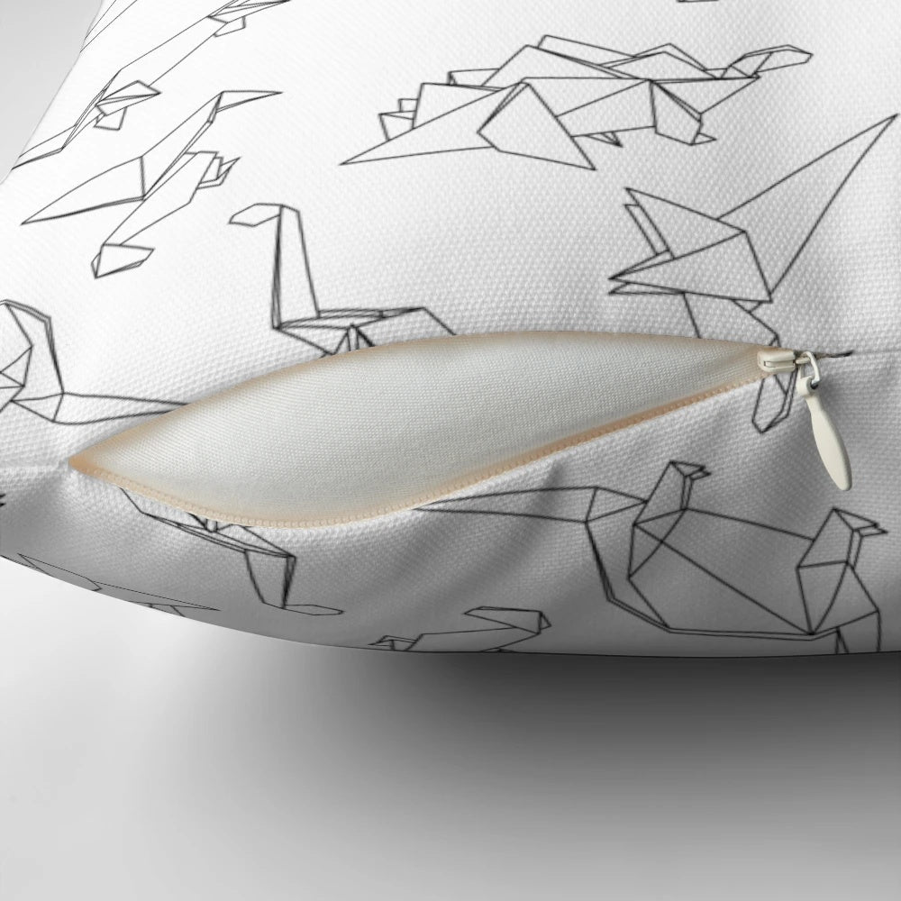 Origami dinosaur-inspired geometric pattern pillow in black and white