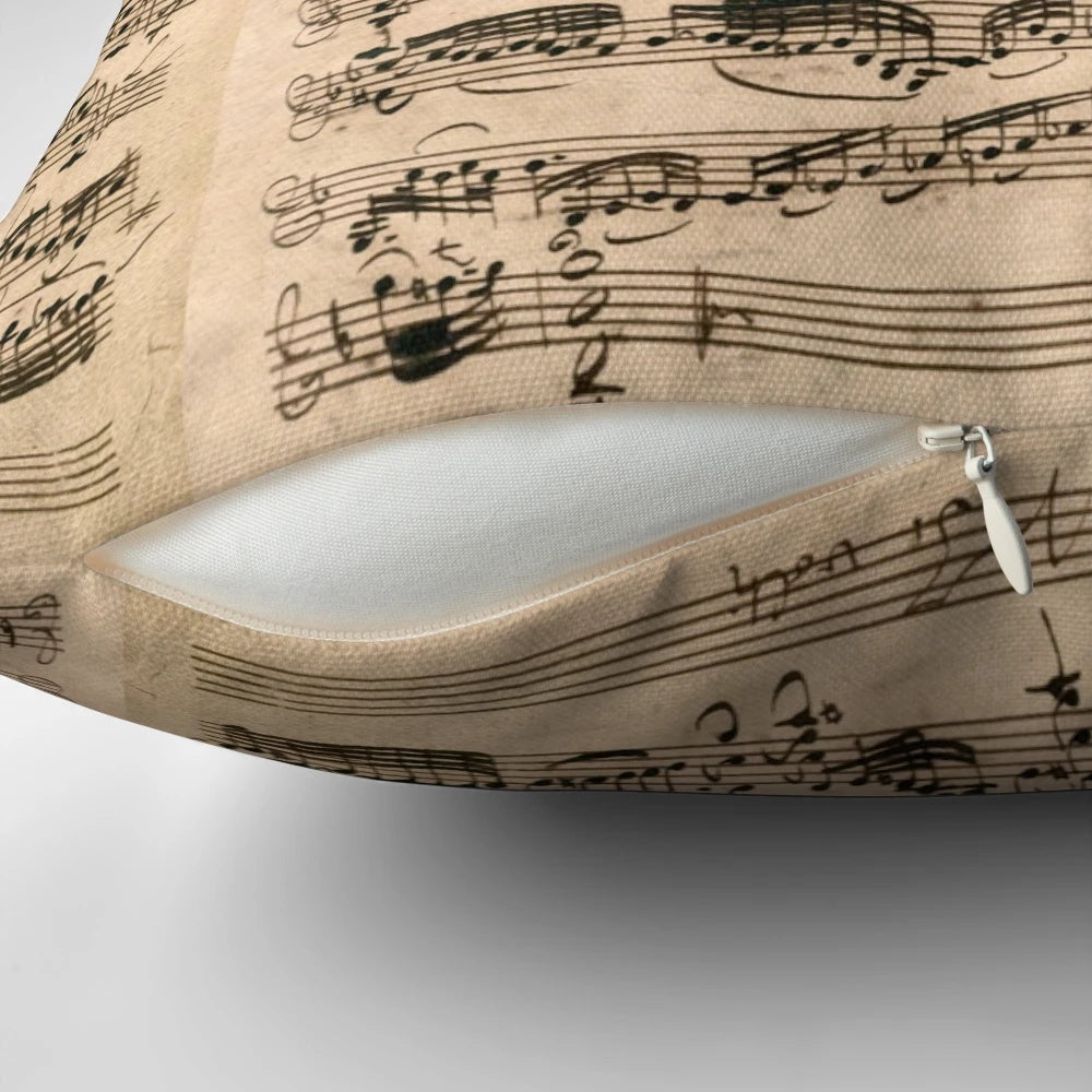 Original handwritten sheet music pillow featuring the compositions of classical composer Johann Sebastian Bach