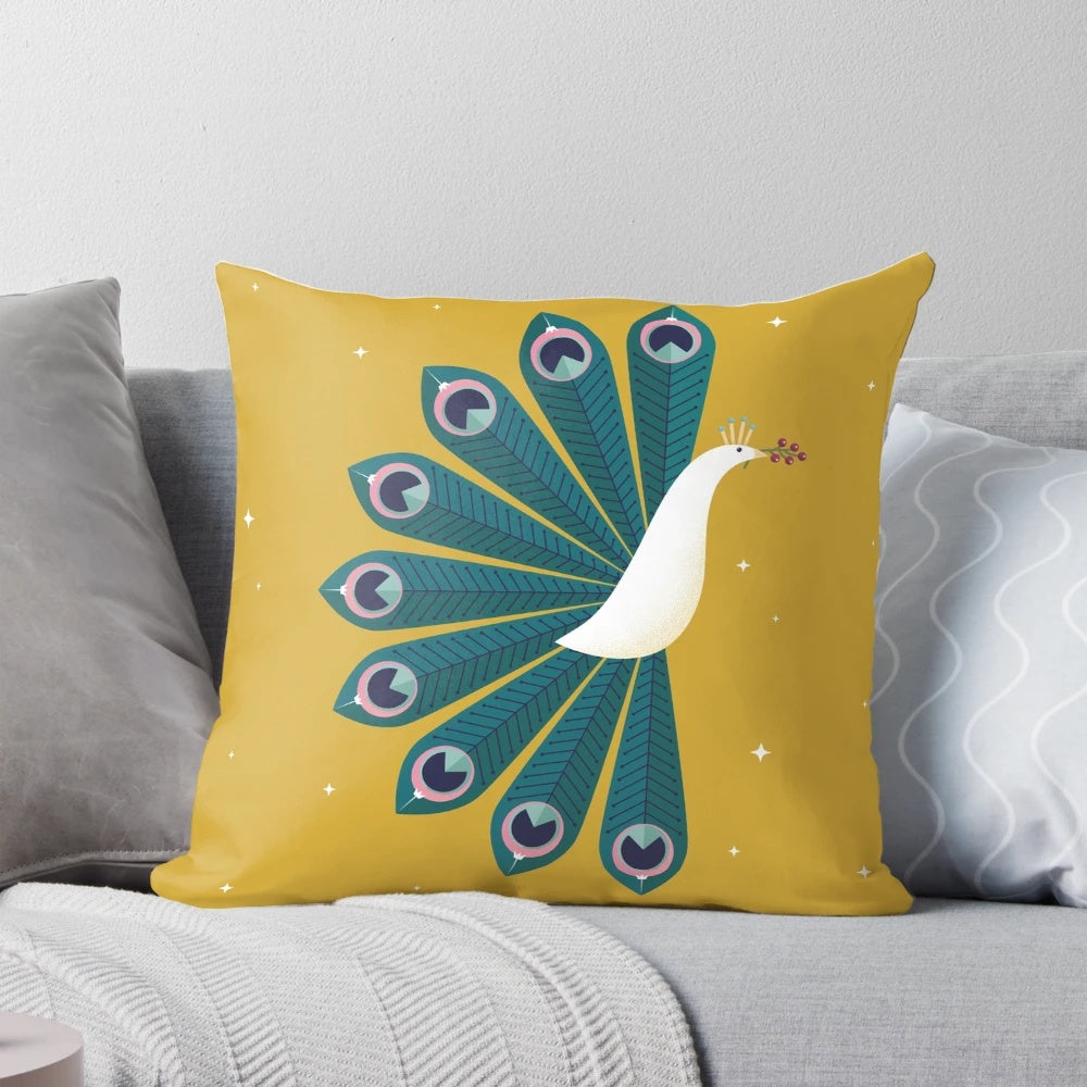 Ornamental peacock design on a gold-colored decorative pillow, perfect for holiday and winter home decor