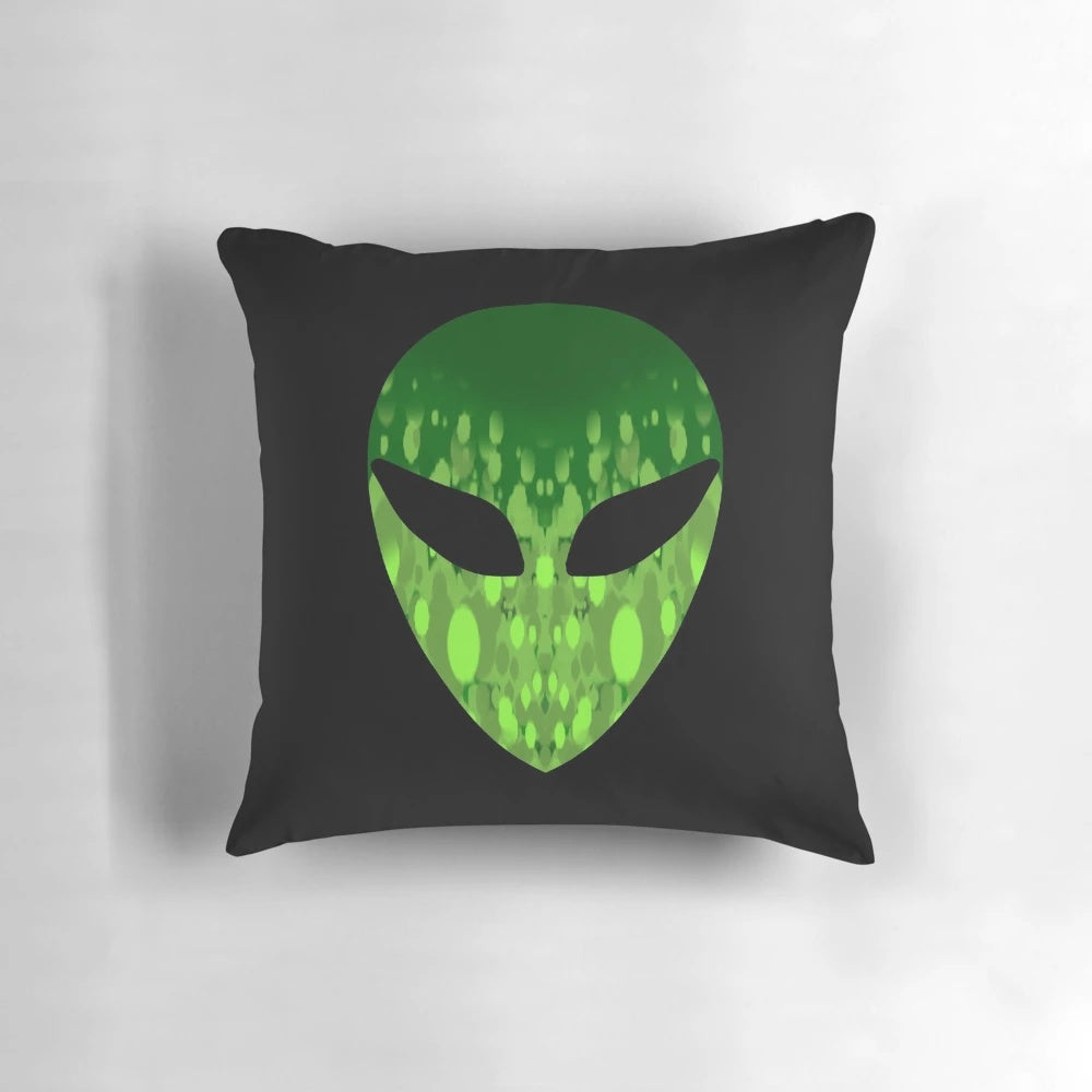 Vibrant green alien head pillow with striking black and fluorescent details