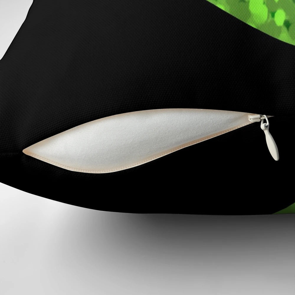 Vibrant green alien head pillow with striking black and fluorescent details