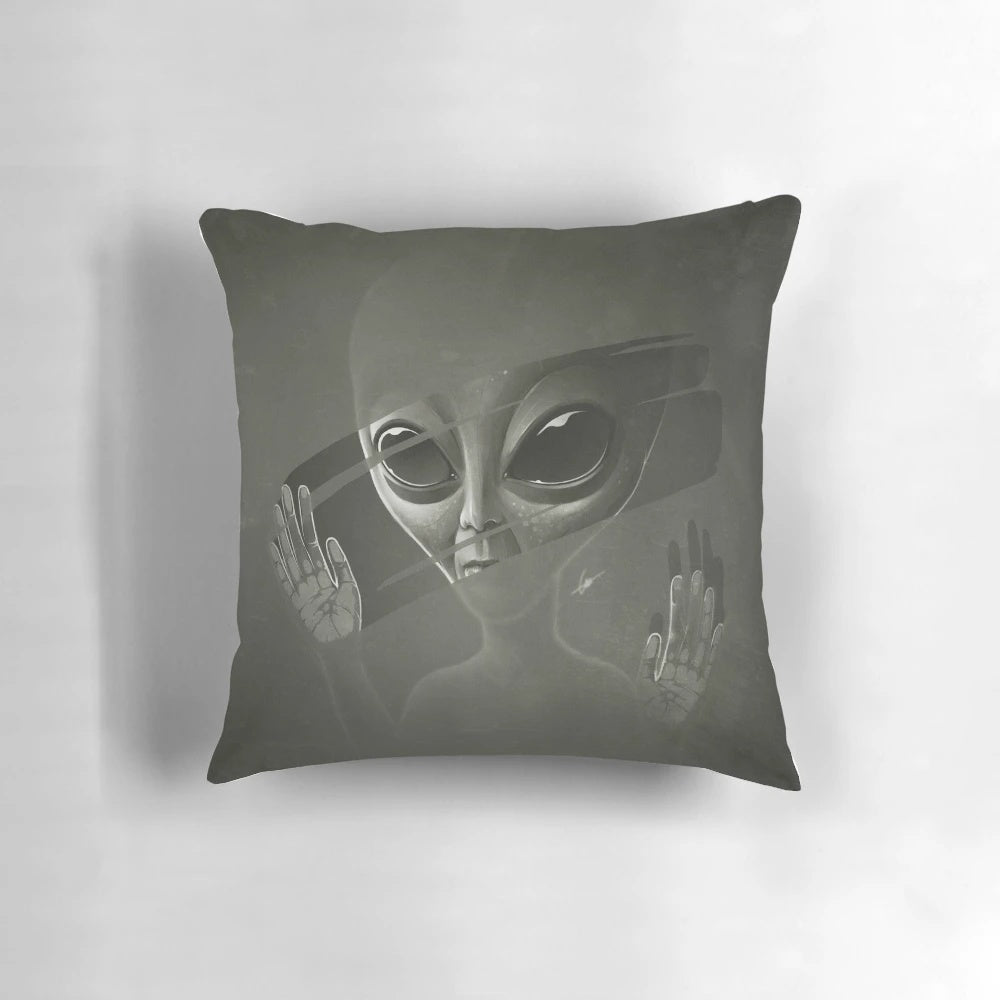 Plush alien pillow with a cosmic, sci-fi design for a unique home decor accent.