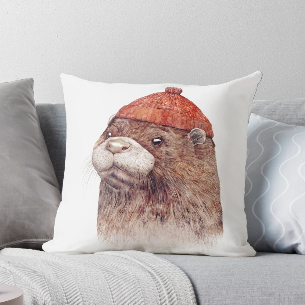 Soft, plush otter pillow in a minimalist, coastal design for nursery, living room, or bedroom decor.