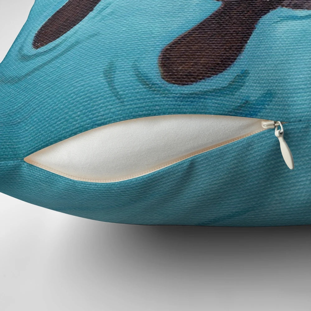 Soft, plush pillow featuring a pair of adorable sea otters holding hands, perfect for romantic home decor.
