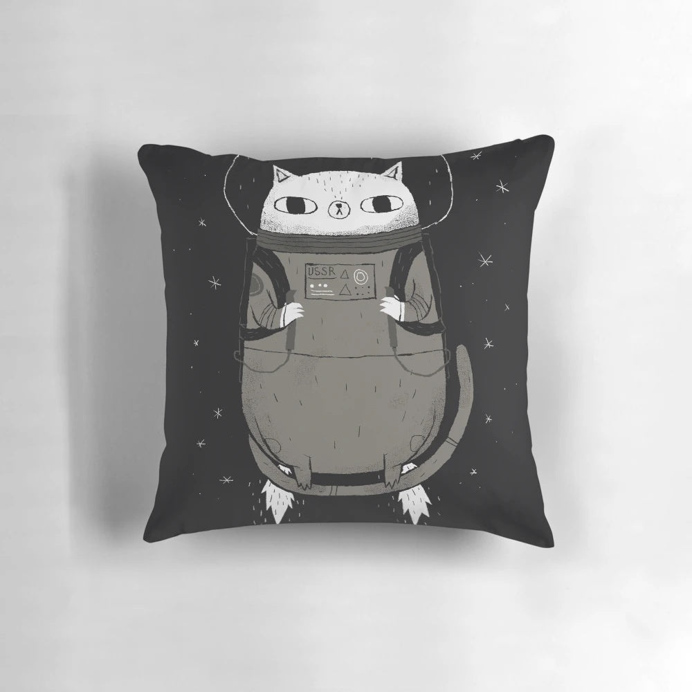 A cozy and whimsical space cat pillow with a cosmic, sci-fi design.