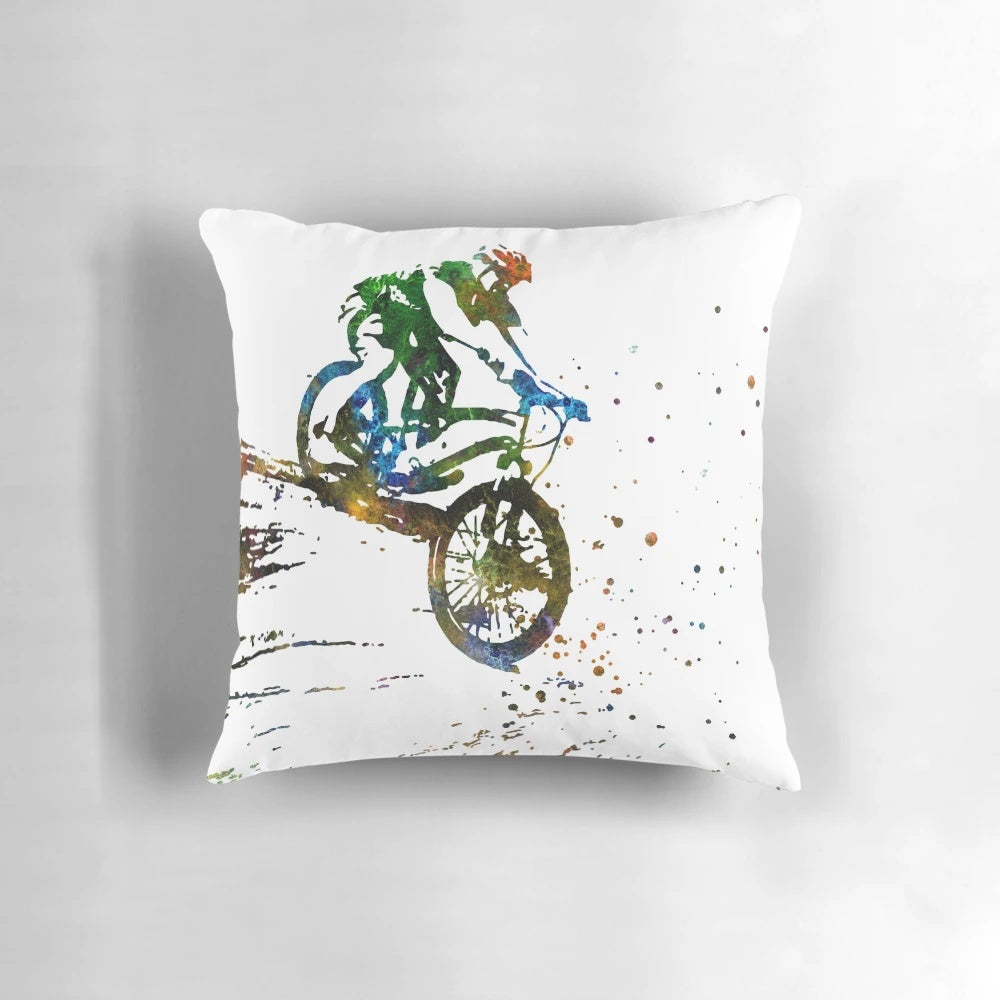 Watercolor painting of a mountain biker riding on a trail in the mountains