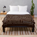 Outlander-inspired plush blanket with word cloud design featuring show elements
