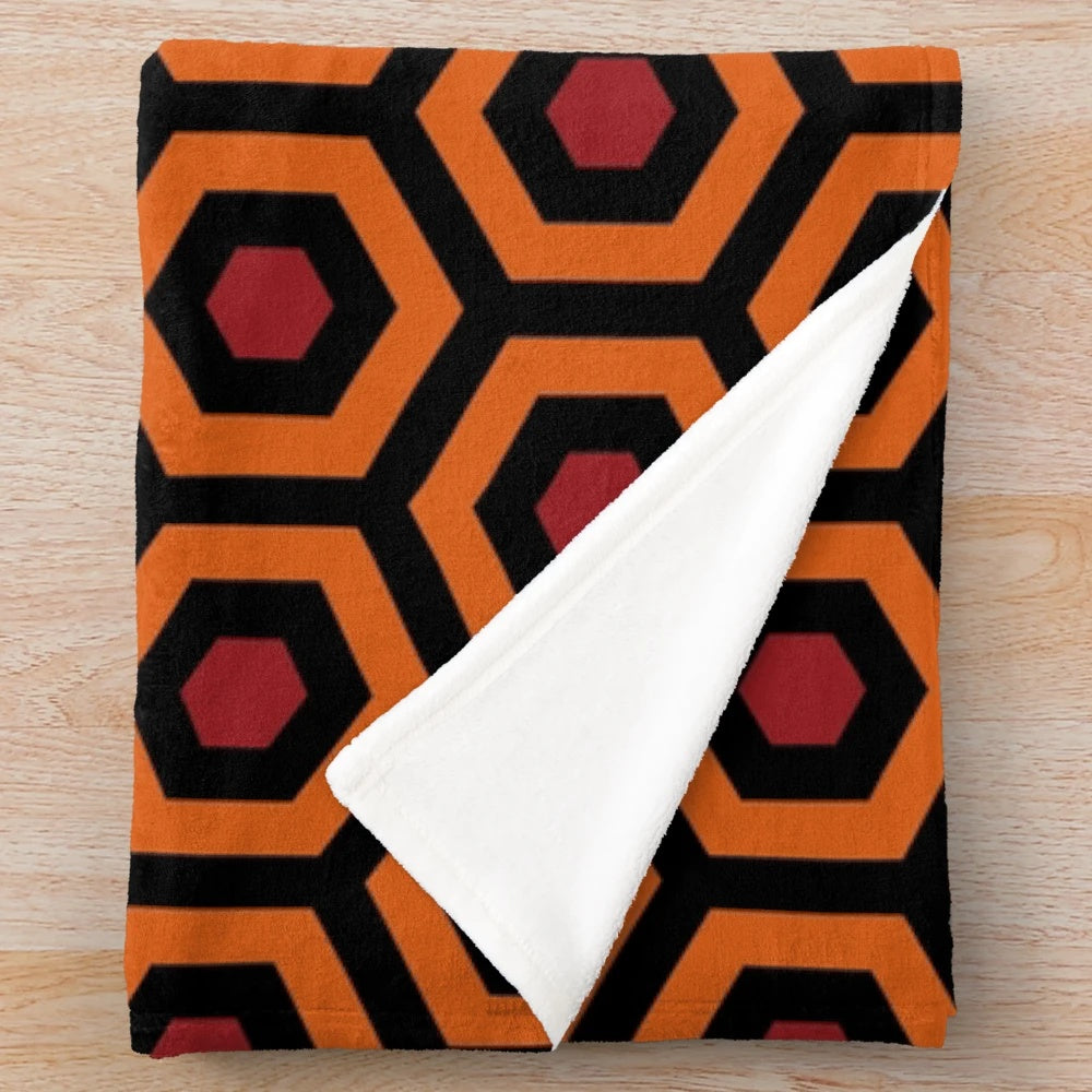 Overlook Hotel inspired plush blanket with geometric hexagon and polygon pattern