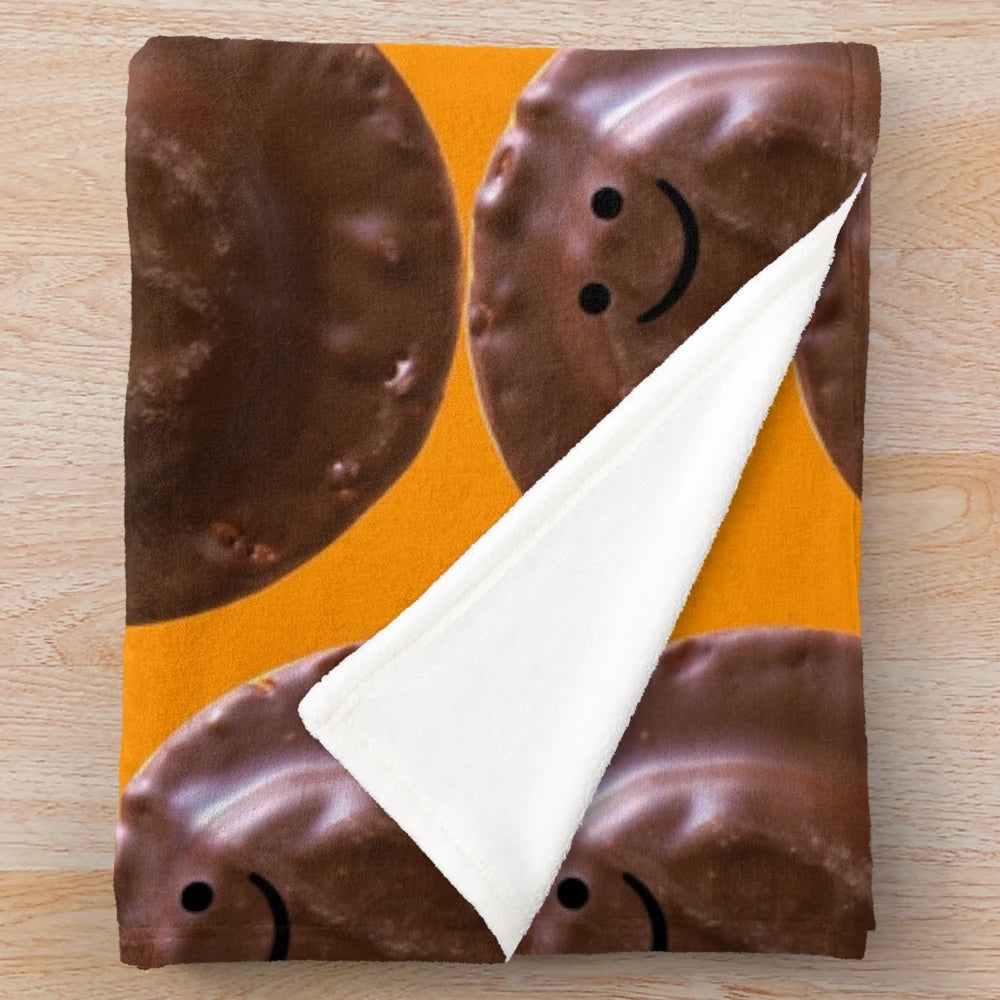 Oversized plush blanket featuring a giant jaffa cake design