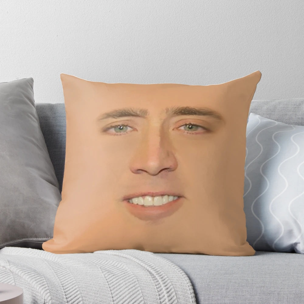 Oversized Nicolas Cage face graphic printed on a large, plush pillow