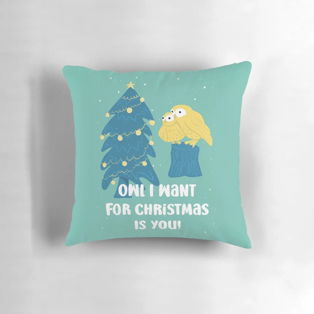 Decorative pillow featuring a cute, whimsical owl design perfect for the holiday season.