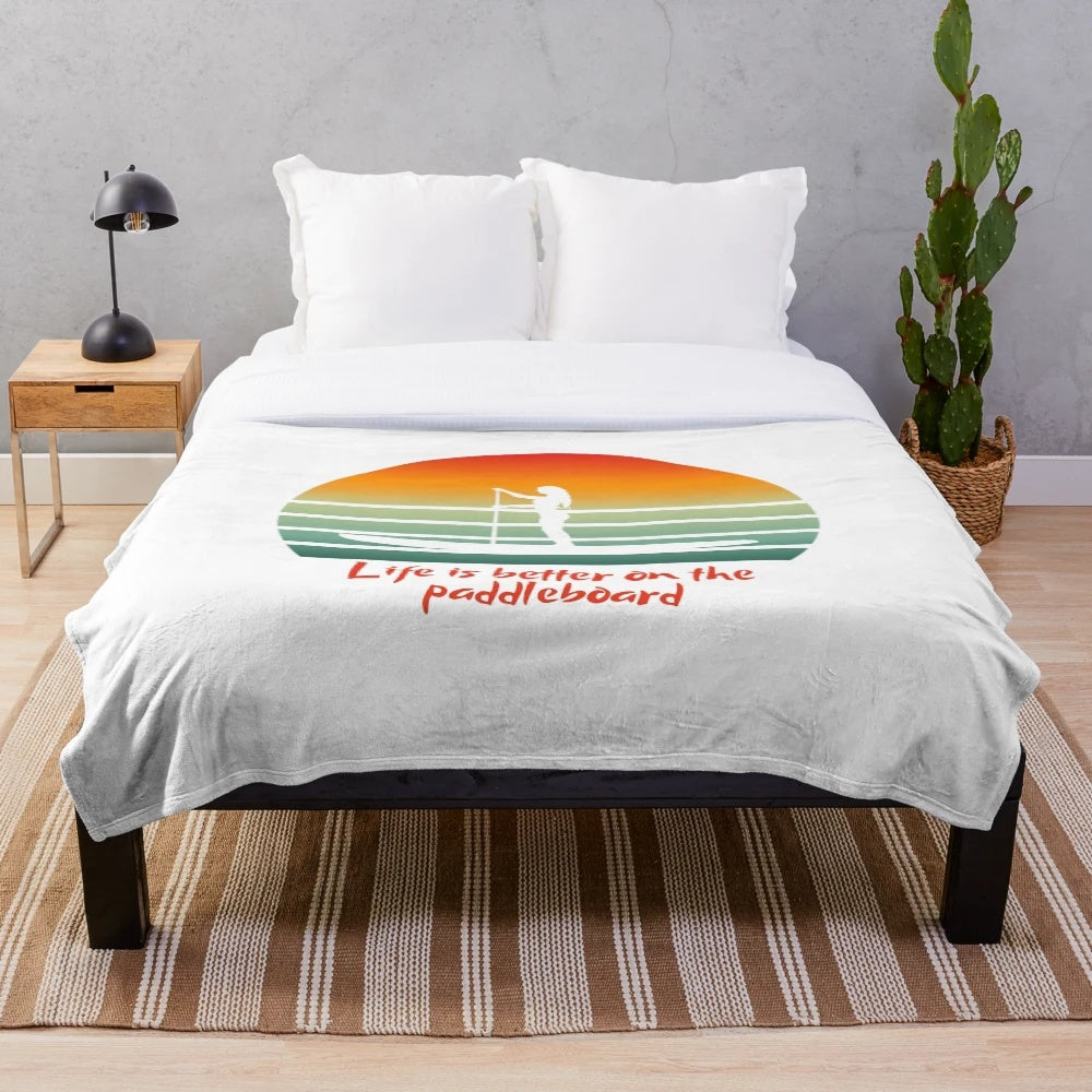 Paddleboard plush blanket with water sports and outdoor adventure design