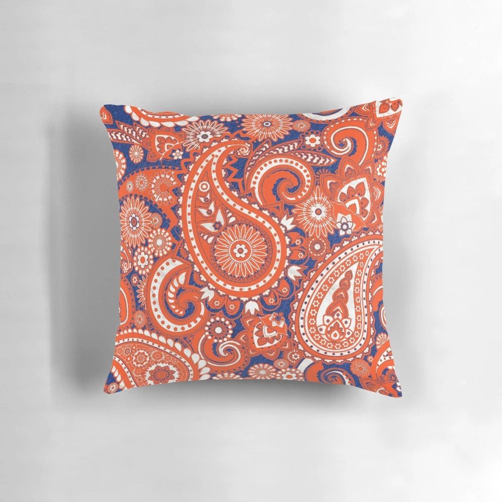 Model wearing a white marble 2 pillow paisley game day dress with Florida Gator colors and a retro paisley pattern.
