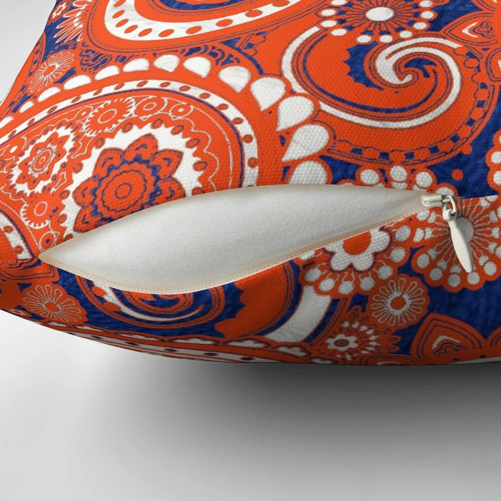 Model wearing a white marble 2 pillow paisley game day dress with Florida Gator colors and a retro paisley pattern.