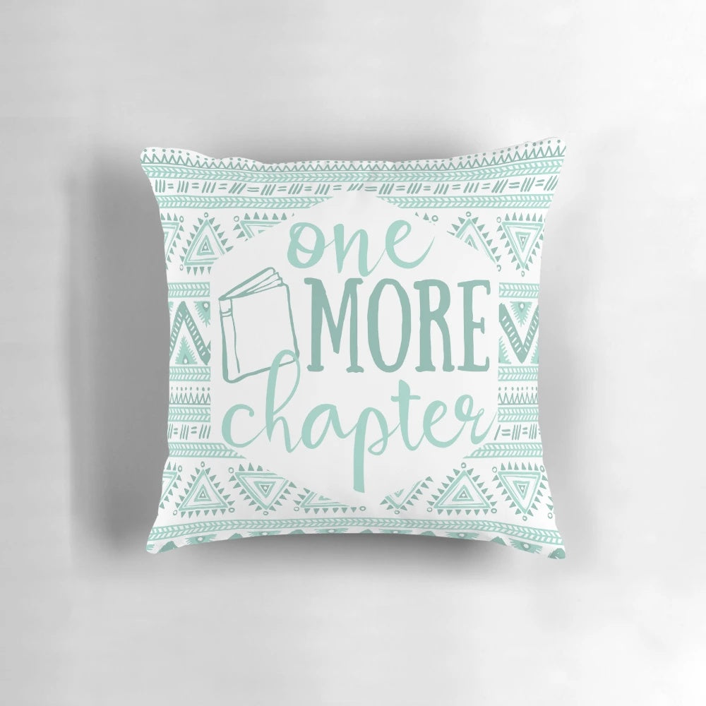 Pale Blue Tribal Pillow with "One More Chapter" text, perfect for avid readers and book enthusiasts.