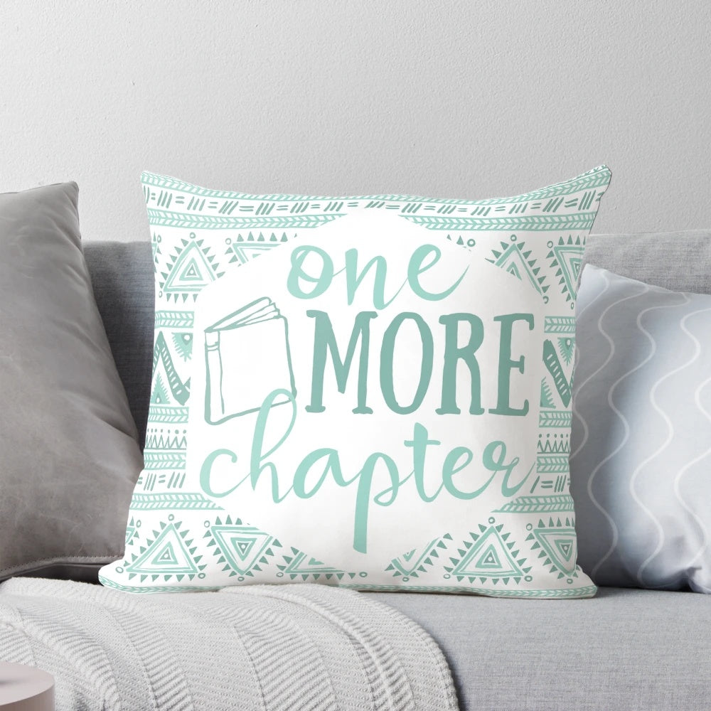 Pale Blue Tribal Pillow with "One More Chapter" text, perfect for avid readers and book enthusiasts.