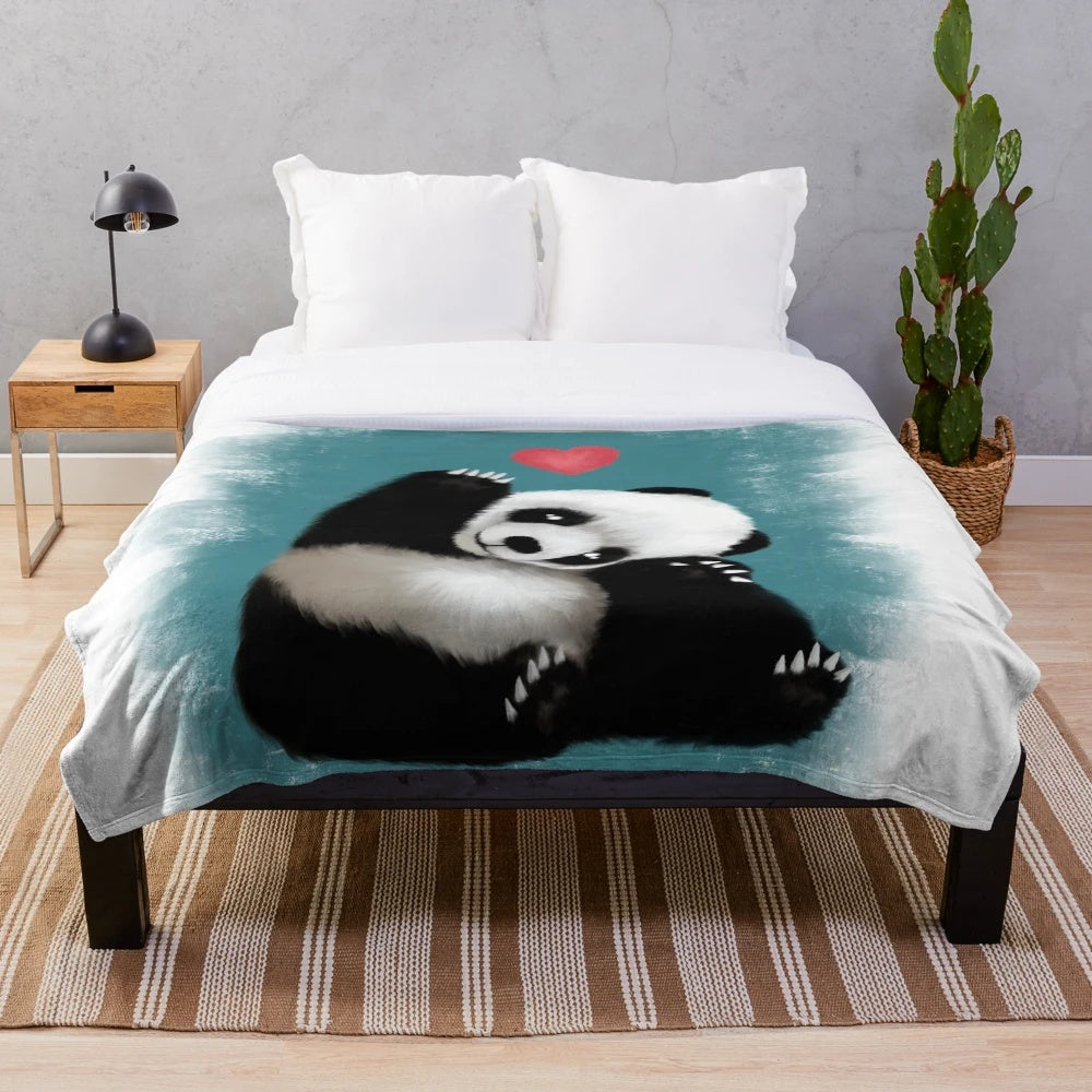 Panda plush blanket in a soft, blue color