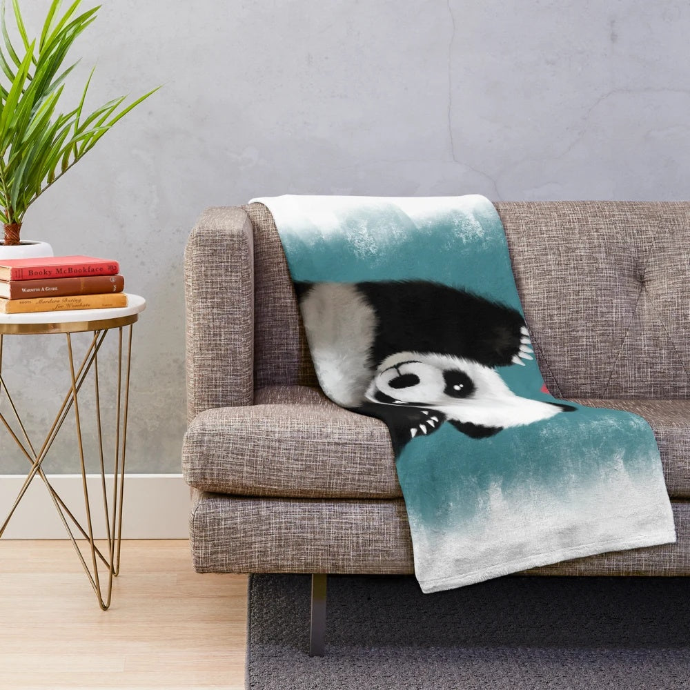Panda plush blanket in a soft, blue color